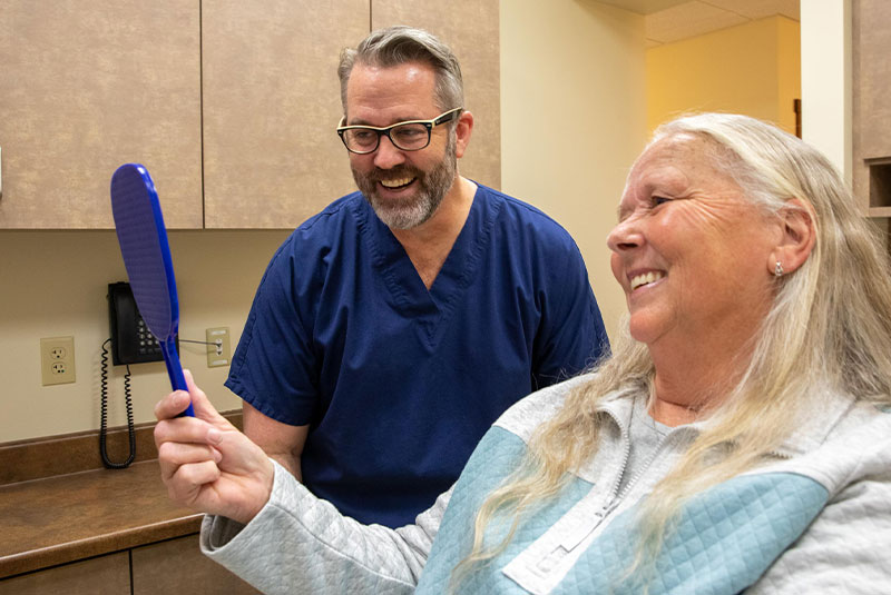 tooth extraction patient smiling