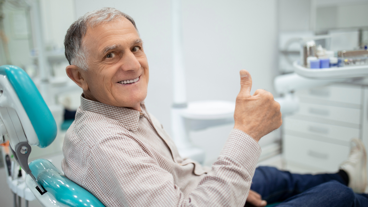 Older man in chair after getting zygomatic implants at Crestline Dental Implant Center